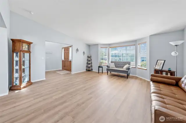 Formal living room large bay window providing an abundance of natural light.