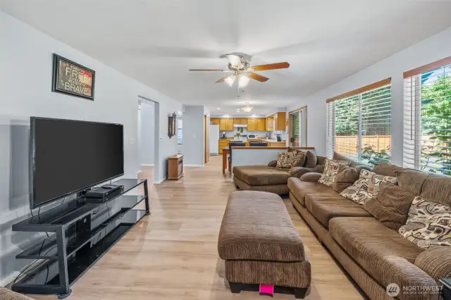 Family room adjacent to the kitchen with eating space.
