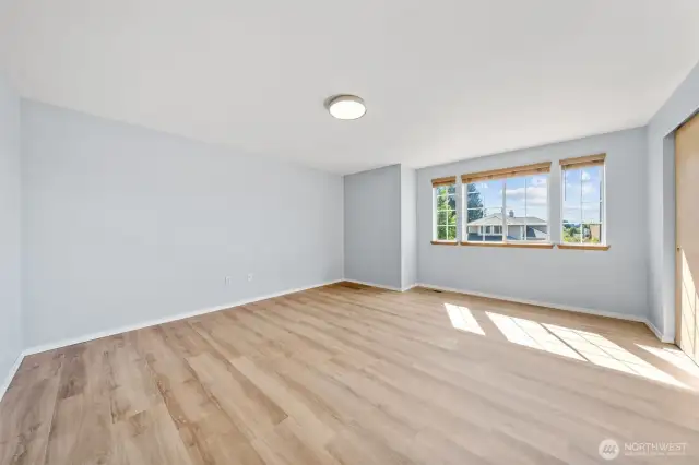 5th bedroom room or bonus room with luxury vinyl plank flooring.