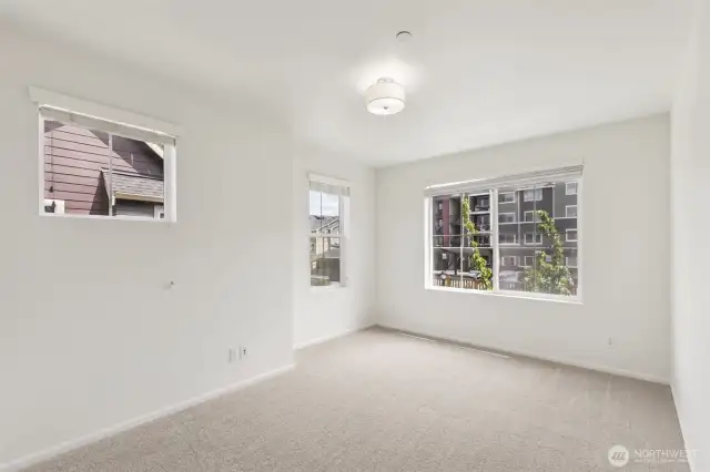Additional view of the secondary bedroom highlights its bright, airy feel and flexible layout—perfect for personalized comfort and everyday use.