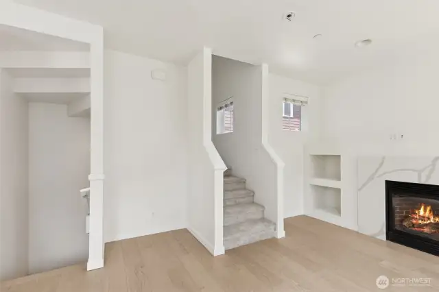 Close-up view of the stairs showcases the thoughtful three-level layout, providing easy access between living spaces, bedrooms, and the flexible lower level.