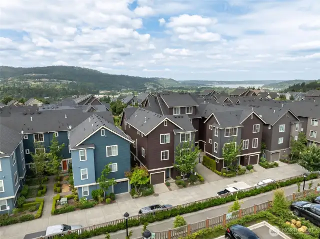 Set along quiet, well-kept streets, the townhomes in Issaquah Highlands feature clean architectural lines, private garages, and walkable access to the best of the neighborhood—blending comfort, design, and community in one beautiful package.