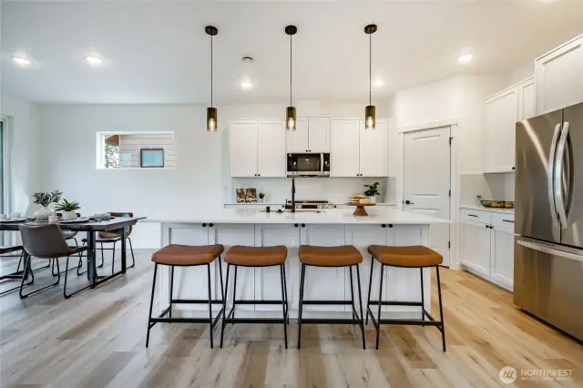 Photos shown are of a similar floor plan previously built in a different neighborhood (The Ridge in Blaine). Finishes and features may vary. Some items pictured reflect buyer-selected upgrades which are not included in the base price and may be added at an additional cost.