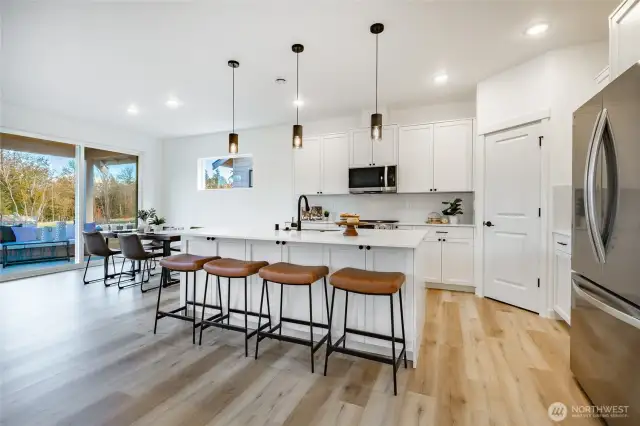 Photos shown are of a similar floor plan previously built in a different neighborhood (The Ridge in Blaine). Finishes and features may vary. Some items pictured reflect buyer-selected upgrades which are not included in the base price and may be added at an additional cost.