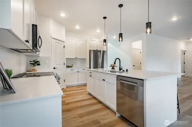 Photos shown are of a similar floor plan previously built in a different neighborhood (The Ridge in Blaine). Finishes and features may vary. Some items pictured reflect buyer-selected upgrades which are not included in the base price and may be added at an additional cost.