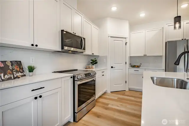 Photos shown are of a similar floor plan previously built in a different neighborhood (The Ridge in Blaine). Finishes and features may vary. Some items pictured reflect buyer-selected upgrades which are not included in the base price and may be added at an additional cost.