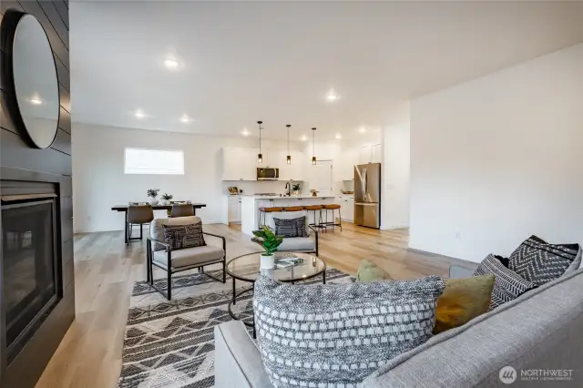 Photos shown are of a similar floor plan previously built in a different neighborhood (The Ridge in Blaine). Finishes and features may vary. Some items pictured reflect buyer-selected upgrades which are not included in the base price and may be added at an additional cost.