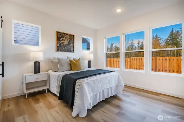 Photos shown are of a similar floor plan previously built in a different neighborhood (The Ridge in Blaine). Finishes and features may vary. Some items pictured reflect buyer-selected upgrades which are not included in the base price and may be added at an additional cost.