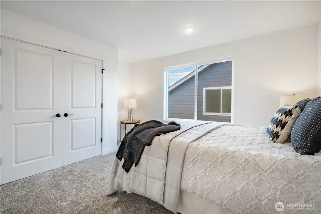 Photos shown are of a similar floor plan previously built in a different neighborhood (The Ridge in Blaine). Finishes and features may vary. Some items pictured reflect buyer-selected upgrades which are not included in the base price and may be added at an additional cost.