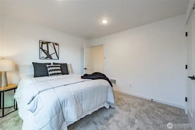 Photos shown are of a similar floor plan previously built in a different neighborhood (The Ridge in Blaine). Finishes and features may vary. Some items pictured reflect buyer-selected upgrades which are not included in the base price and may be added at an additional cost.