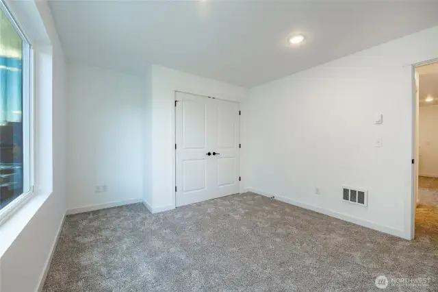 Photos shown are of a similar floor plan previously built in a different neighborhood (The Ridge in Blaine). Finishes and features may vary. Some items pictured reflect buyer-selected upgrades which are not included in the base price and may be added at an additional cost.