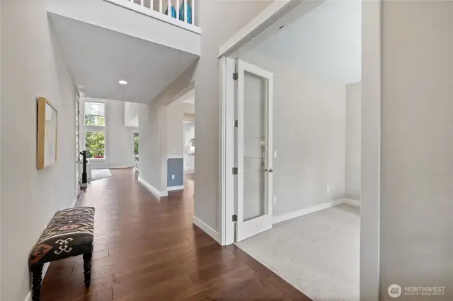 Above entry is a 2nd Level balcony which is 2-sided:  overlooks entry on one side and living room on the other