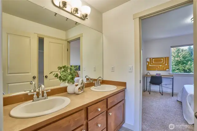 Upstairs bathroom is jack and Jill bathroom connects to both upstairs bedrooms
