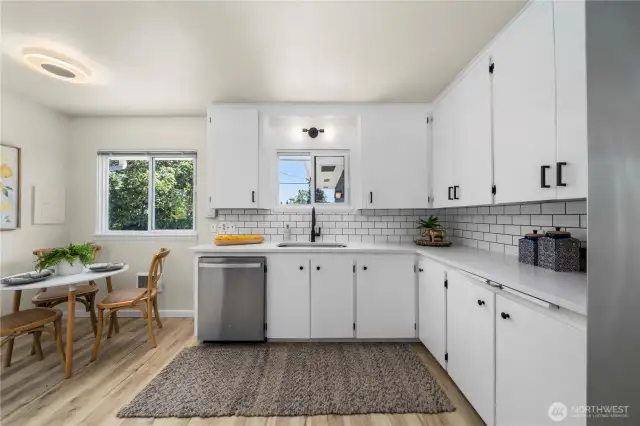 Spacious kitchen overlooks backyard