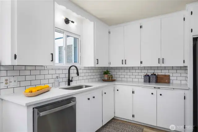 Quartz countertops & tiled backsplash