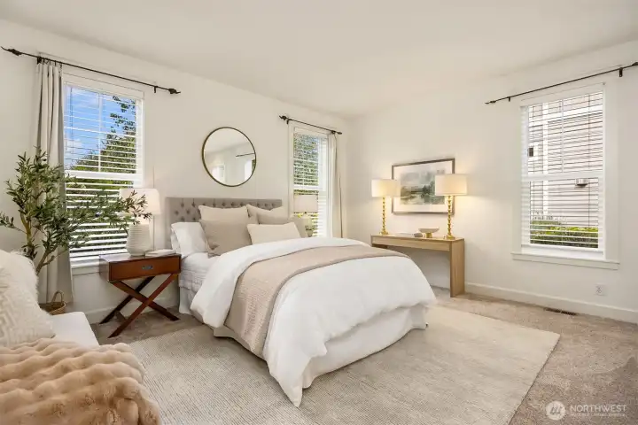 The spacious, sunny, main floor primary suite.