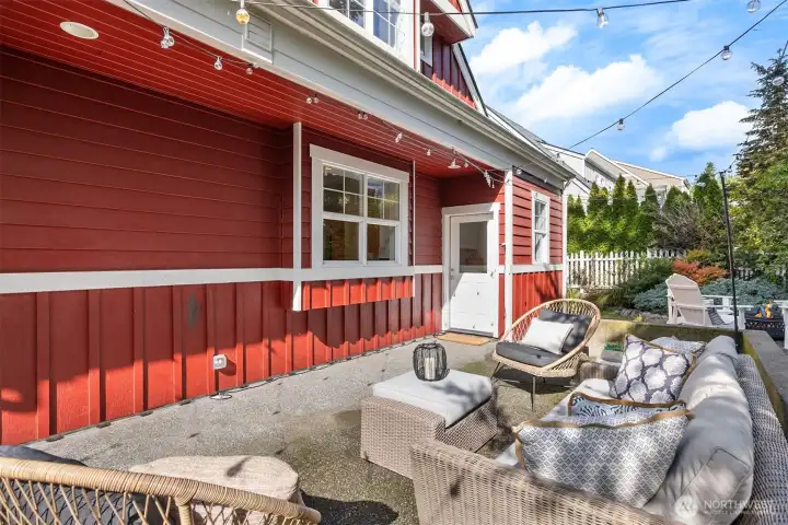 Two entrances to the backyard include the dining room and the utility/mud room.