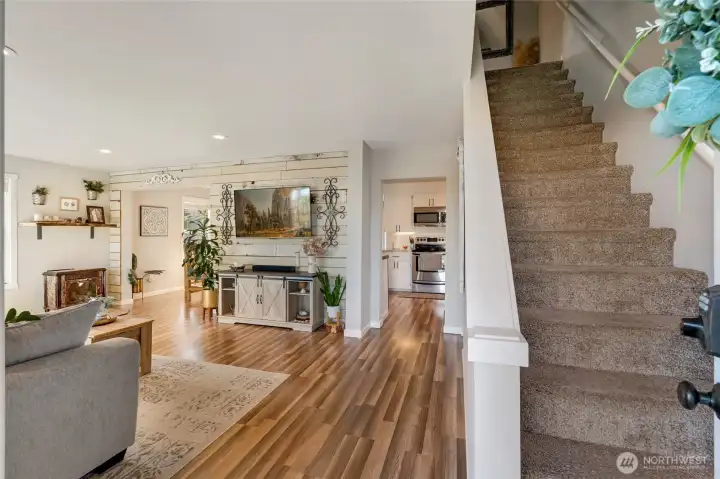 Bright, open living room upon entry…