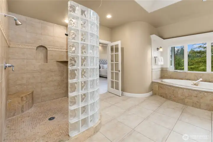 Gorgeous tile surround and glass block double shower.