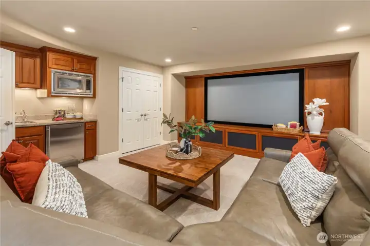 A true theatre room for one or many! Built in speakers, surround sound, plus a wet bar, mini- fridge and microwave. Bring on the popcorn.