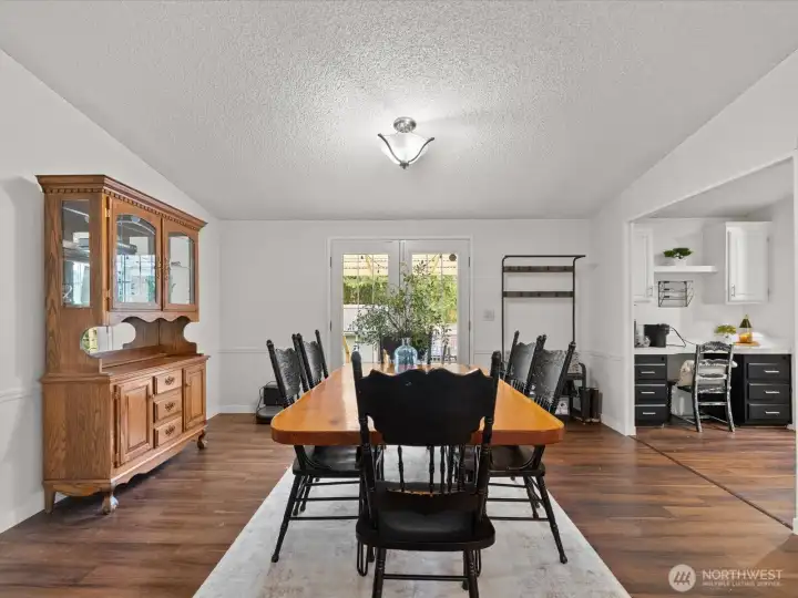 Dining room. Off to right leads to kitchen.