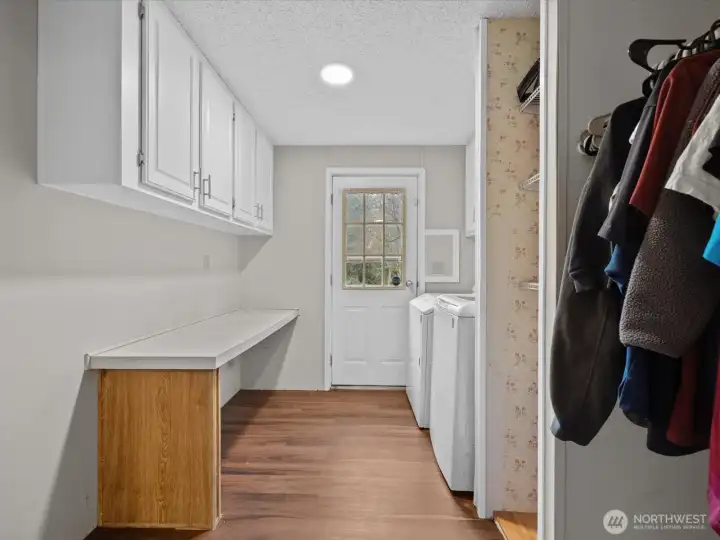 Utility room with cabinetry, closet & counter space - very spacious. All appliances.