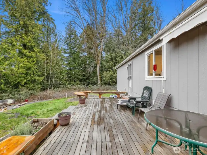 Back deck length of the home.