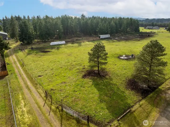 12+ acres with fenced pasture