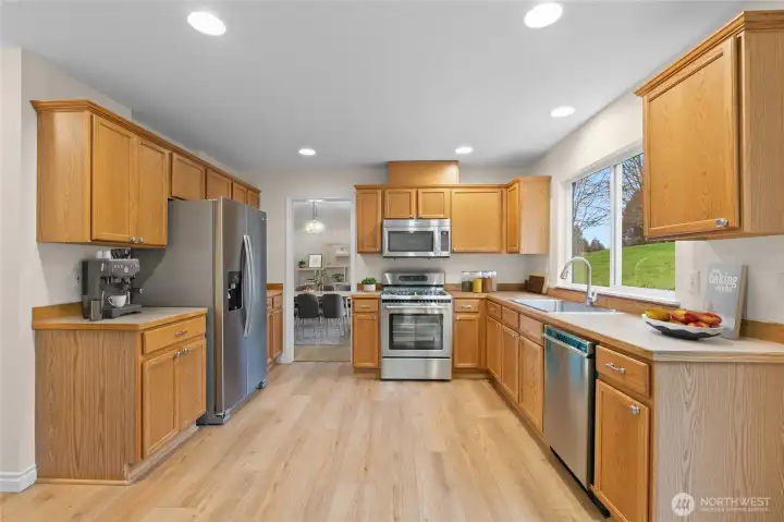Kitchen offers lots of counter space and new stainless steel appliances