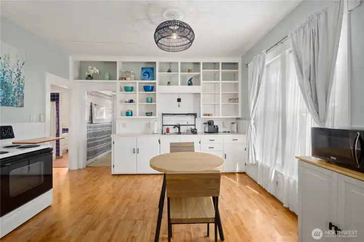 Bright, open kitchen with dining area