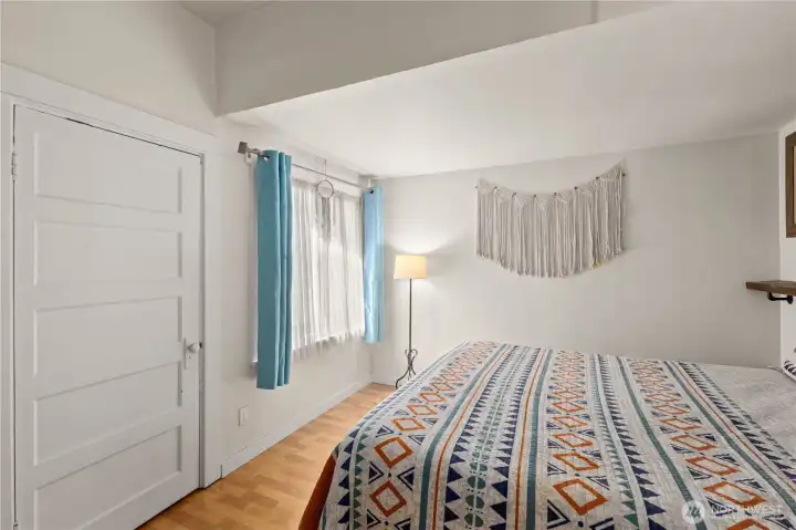 Primary bedroom on main level with garden view