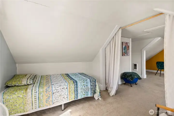 Twin bed in nook, but room for a second twin or larger bed