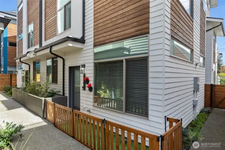 This home is already set up with a little fence and astroturf area for little dogs to be able to get a quick outside break.