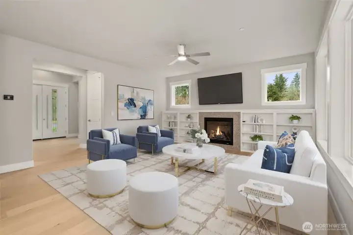 Gorgeous great room adjacent to the dining room. Cabinets shown are not included and are shown for design purposes with virtual staging.