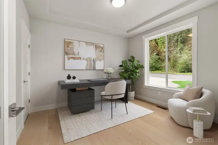 Main floor Den, possible 5th Bedroom w/ hardwood floors and wood wrapped window.