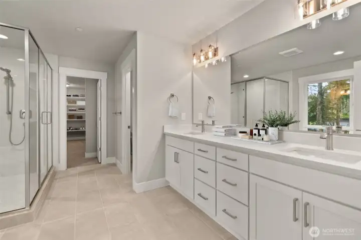 Exquisite Primary 5 Piece En-suite with tile floors, tile shower w/ glass enclosure and huge walk in closet.