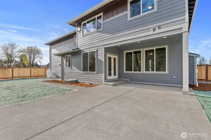 Generous concrete patio
