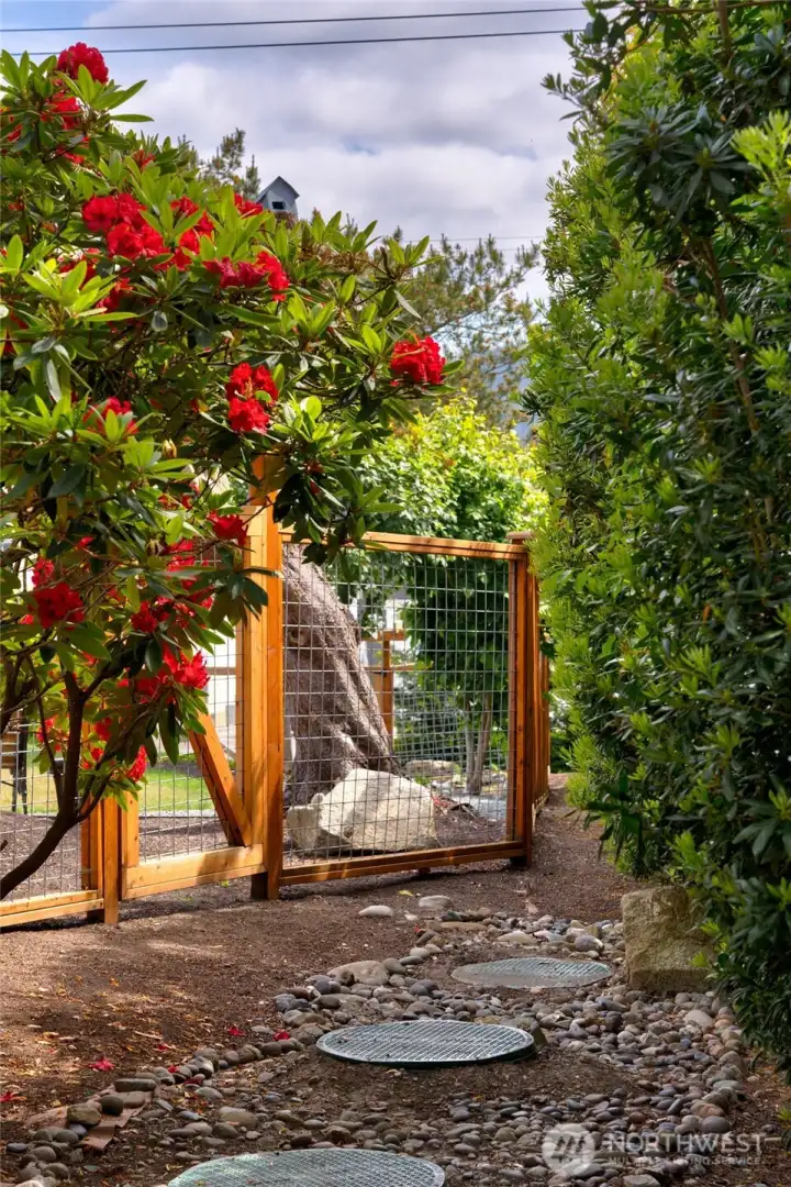Mature landscaping and gated privacy create a peaceful garden retreat. Mature landscaping and gated privacy create a peaceful garden retreat.