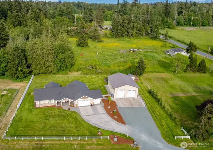 Nicely landscaped level acre lot.