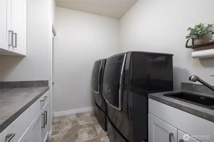 Large laundry located near the primary suite.