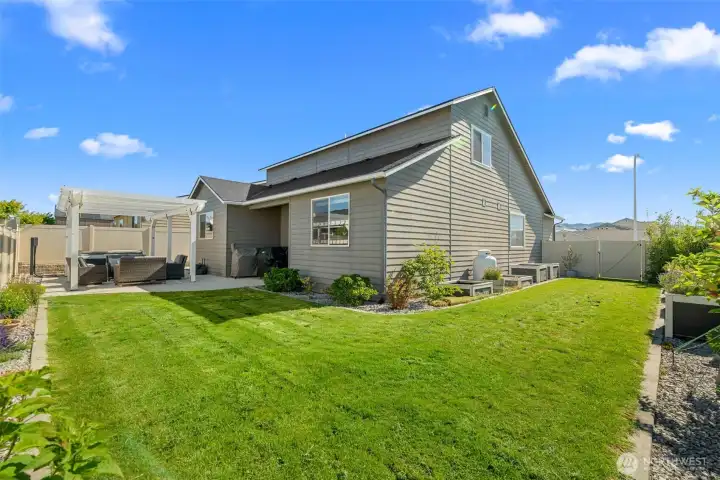 Fully fenced private back and side yard