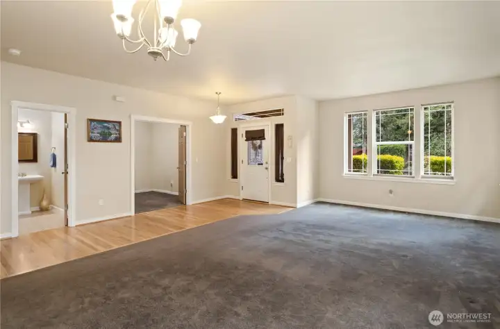 Upon entering the home you'll be invited to a sitting room and dining area on the left.