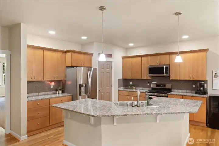 Freshly updated quartz countertops and back splash.