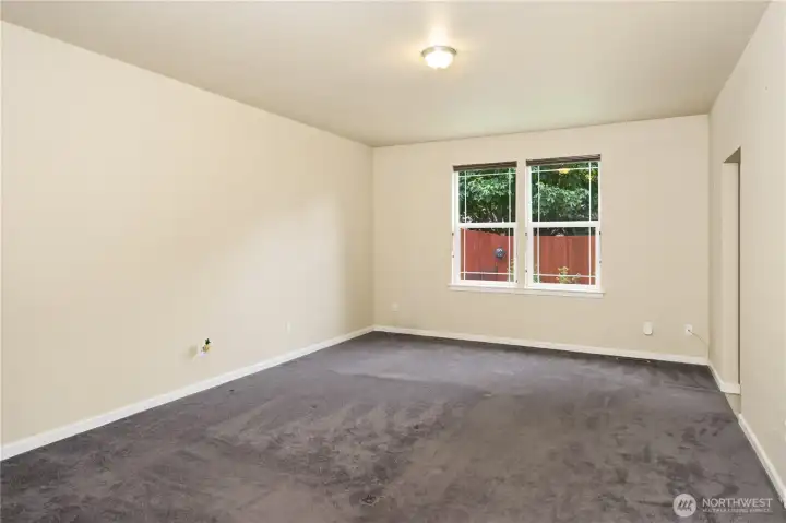 Spacious primary bedroom with ensuite bath and closet.