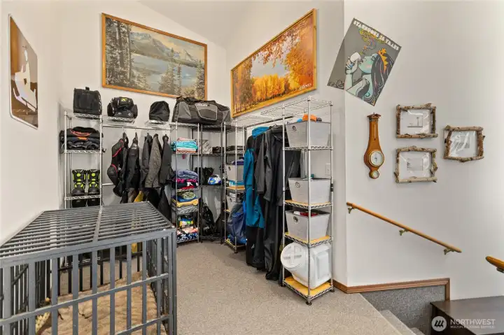 Spacious mudroom provides the perfect drop zone for all your recreational gear, conveniently located just inside the home from the garage.