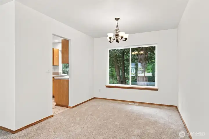 Another view of the formal dining room, perfect for entertaining. The most precious guests to just a good card game with friends. Another view of the formal dining room, perfect for entertaining. The most precious guests to just a good card game with friends.