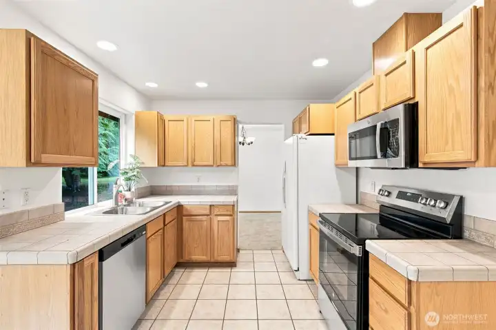 Loads of counter space and easy. Cooking and baking in this big galley kitchen. Loads of counter space and easy. Cooking and baking in this big galley kitchen.