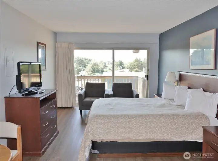 Studio unit w/ full-sized bed and LVP flooring. Studio unit w/ full-sized bed and LVP flooring.