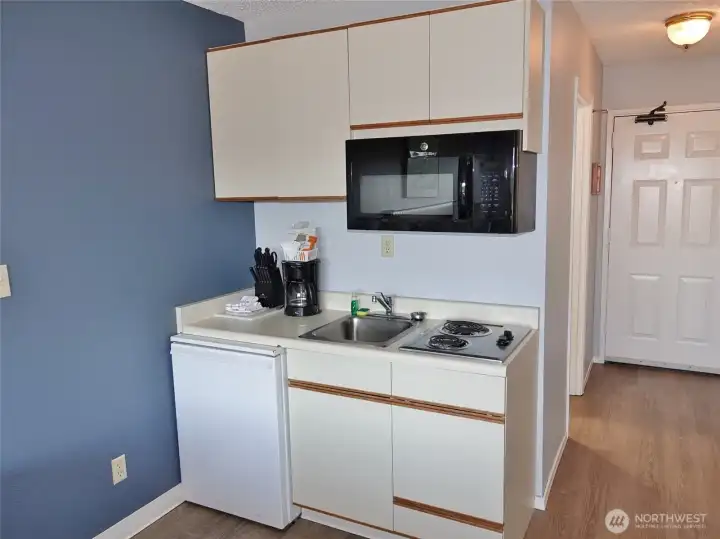 Kitchenette w/ mini-frig, microwave, sink, and a 2-burner stove-top. Kitchenette w/ mini-frig, microwave, sink, and a 2-burner stove-top.
