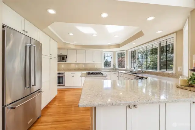 Large kitchen, beautiful cabinetry, stainless steel appliances, and endless counter space!
